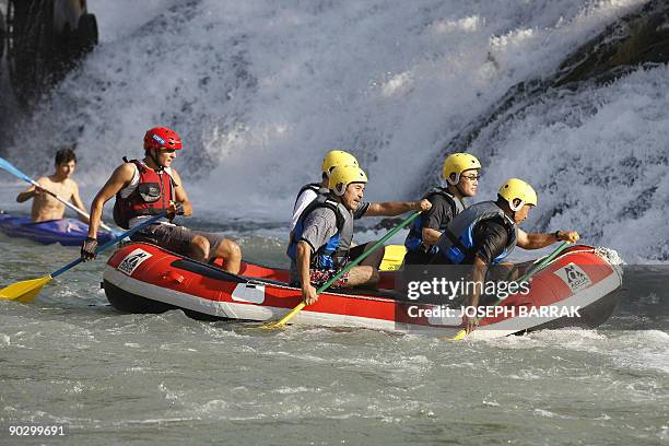 Japanese tourits practice rafting in the waters of Al-Assi river in Lebanon's Hermel region in the eastern Bekaa valley, near the border with Syria,...