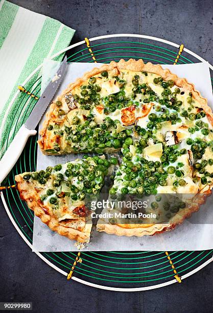pea and goats cheese tart with slice cut out - mushroom pie stock pictures, royalty-free photos & images