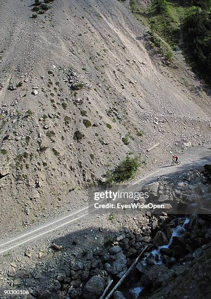 Female Mountainbiker on a tour through the valley of Tegestal to the mountain hut Tarrenton Alm. On August 1, 2009 in Nassereith near Innsbruck,...