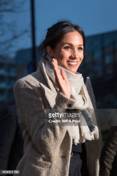 Meghan Markle waves to the crowd as she after a visit to Reprezent 107.3FM in Pop Brixton on January 9, 2018 in London, England. The Reprezent...