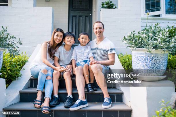portrait of a family enjoying free time outdoors - australian family time stock pictures, royalty-free photos & images