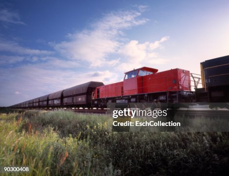 Large Red Train Large Freight Train With Red Locomotive In Front High-Res Stock Photo ...
