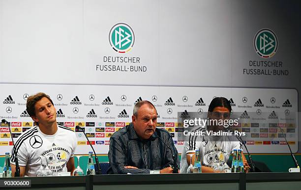 Rene Adler, press officer Harald Stenger and Sami Khedira attend the German Football National Team press conference at the Guerzenich Koeln on...