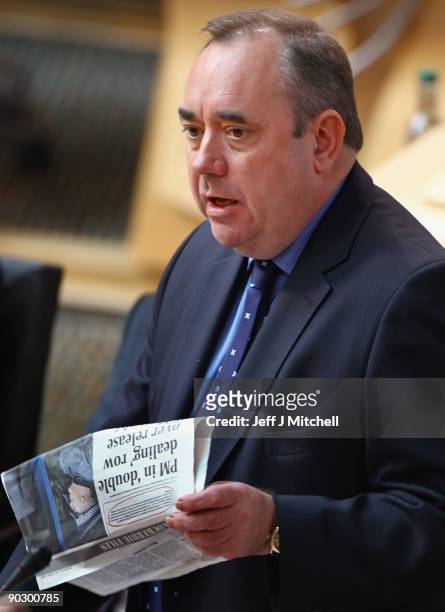 Scottish First Minister Alex Salmond quotes a newspaper article during the debate on the handling of the release of the terminally ill Lockerbie...