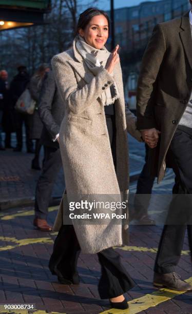Meghan Markle waves to the crowd as she after a visit to Reprezent 107.3FM in Pop Brixton on January 9, 2018 in London, England. The Reprezent...