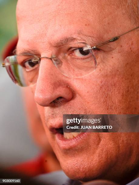 Portuguese Foreign Minister Augusto Santos Silva talks during a visit to the main port of "La Guaira" in Caracas on January 9 , 2018. / AFP PHOTO /...