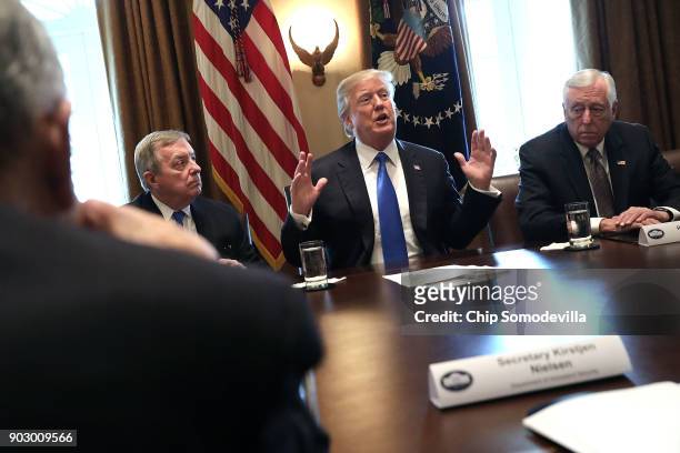 President Donald Trump presides over a meeting about immigration with Republican and Democrat members of Congress, including Senate Minority Whip...