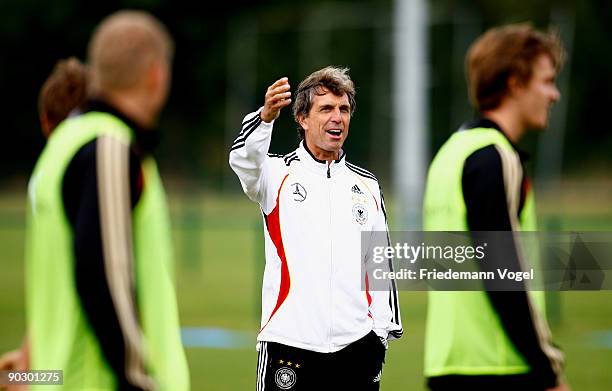 Coach Rainer Adrion of Germany gives instructions to his players during the U21 Germany training session on September 2, 2009 in Vaals, Netherlands.