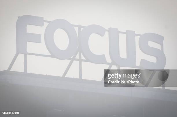 The Focus park shopping mall is seen through thick smog on January 8, 2018 in Bydgoszcz, Poland.