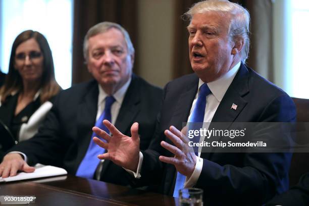 President Donald Trump presides over a meeting about immigration with Republican and Democrat members of Congress, including Rep. Martha McSally and...