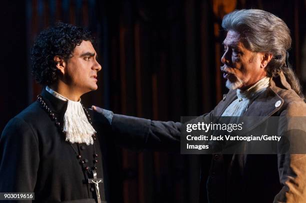 Mexican-born French tenor Rolando Villazon and American bass Samuel Ramey perform during the final dress rehearsal of Act 3, scene 2 of the...