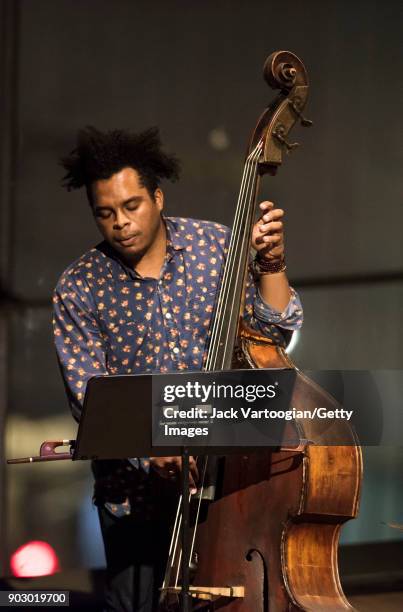 American musician Rashaan Carter plays upright acoustic bass as he performs with the Arun Ramamurthy Trio during the South Asian Music and Arts...