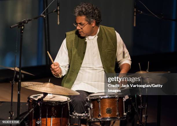 Indian musician Sameer Gupta plays drums as he performs with the Arun Ramamurthy Trio during the South Asian Music and Arts Association's Indo-Jazz...