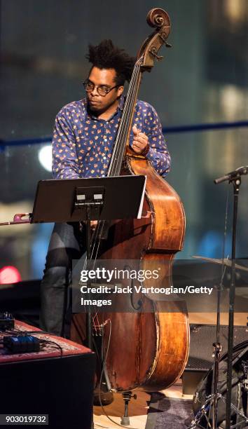 American musician Rashaan Carter plays upright acoustic bass as he performs with the Arun Ramamurthy Trio during the South Asian Music and Arts...