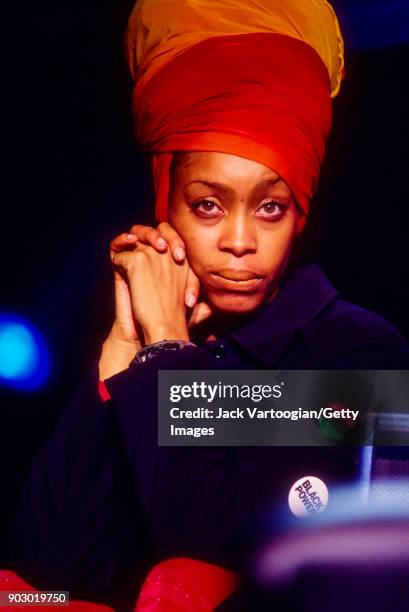 View of American Soul, R&B, and Hiphop musician Erykah Badu as she looks on from upstage during the Rhythm & Blues Foundation's Pioneer Awards at the...