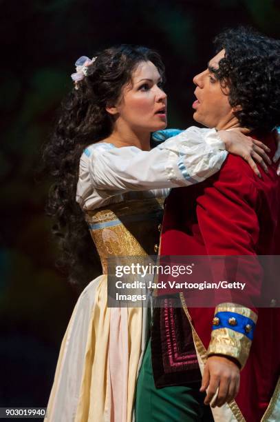 Russian soprano Anna Netrebko and Mexican-born French tenor Rolando Villazon perform during the final dress rehearsal of Act 2 of the Metropolitan...