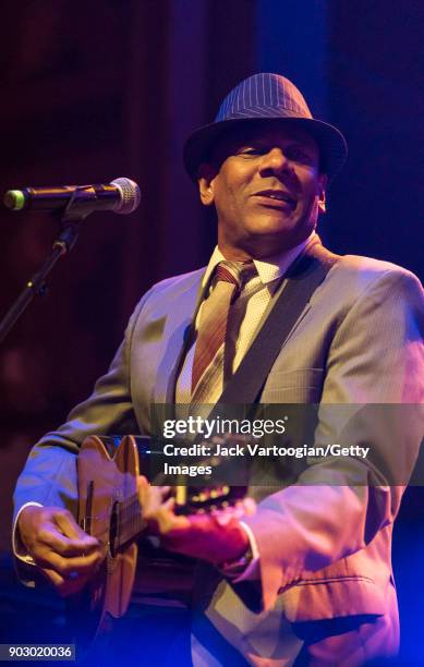 Cuban Son cubano musician and bandleader Fernando Enrique Dewar plays tres as he leads his group Septeto Santiaguero during GlobalFest 2017 on...