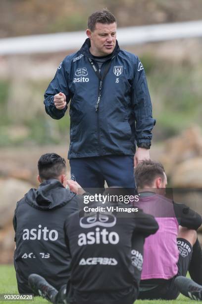 Coach John Stegeman of Heracles Almelo talks to his players during a training session of Heracles Almelo at the Don Julia resort on January 09, 2018...