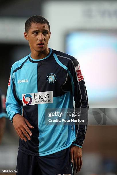 Lewis Montrose of Wycombe Wanderers in action during the Johnstone's Paint Trophy First Round Match between Wycombe Wanderers and Northampton Town at...