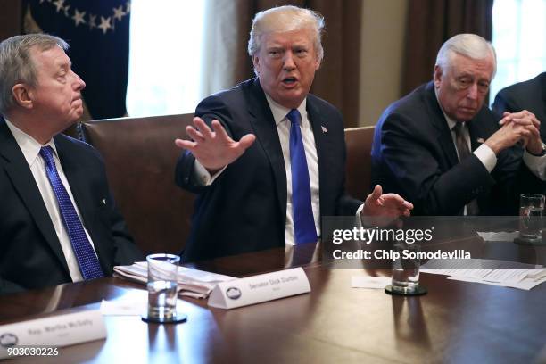 President Donald Trump presides over a meeting about immigration with Republican and Democrat members of Congress, including Senate Minority Whip...