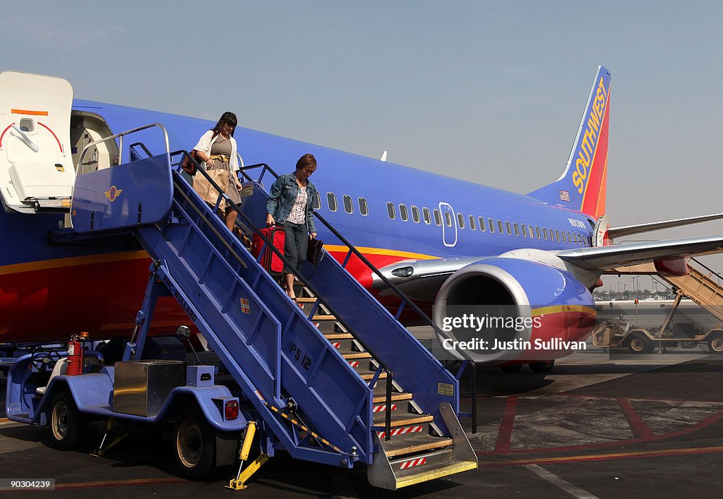 Southwest Airline Passengers Exit Plane In Burbank