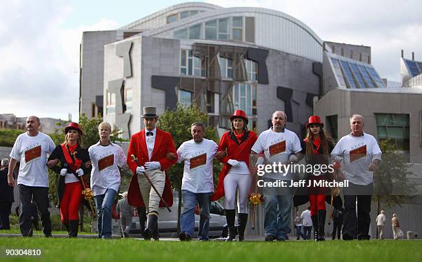 Johnnie Walker employees protest over the proposed closure of its Kilmarnock plant outside of the Scottish Parliament on September 2, 2009 in...