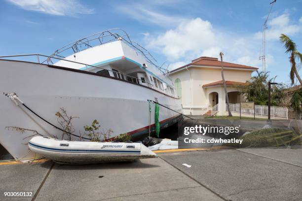 boat up on dock after hurricane irma, st john - cruz bay harbor stock pictures, royalty-free photos & images