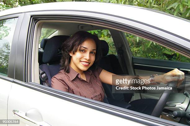 female sporting a new car - beed stock pictures, royalty-free photos & images