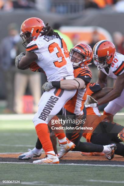Clayton Fejedelem of the Cincinnati Bengals makes the hit on Isaiah Crowell of the Cleveland Browns during their game at Paul Brown Stadium on...