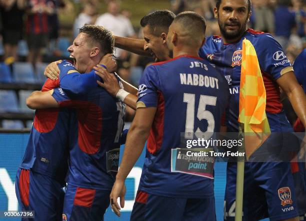 Patricio Rodriguez of the Jets celebrates a goal with team mates during the round 15 A-League match between the Newcastle Jets and the Central Coast...