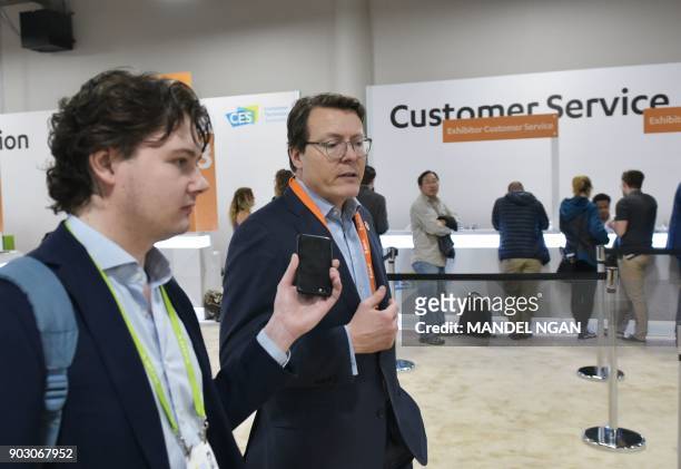 Prince Constantijn of the Netherlands walks through the Sands Convention Hall during CES 2018 in Las Vegas on January 9, 2018. / AFP PHOTO / MANDEL...