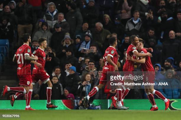Bobby Reid of Bristol City celebrates scoring a goal to make the score 0-1 during the Carabao Cup Semi-Final first leg match between Manchester City...