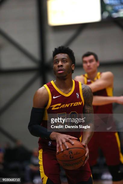 Kevin Olekaibe of the Canton Charge shoots a free throw against the Grand Rapids Drive at The DeltaPlex Arena for the NBA G-League on JANUARY 6, 2018...