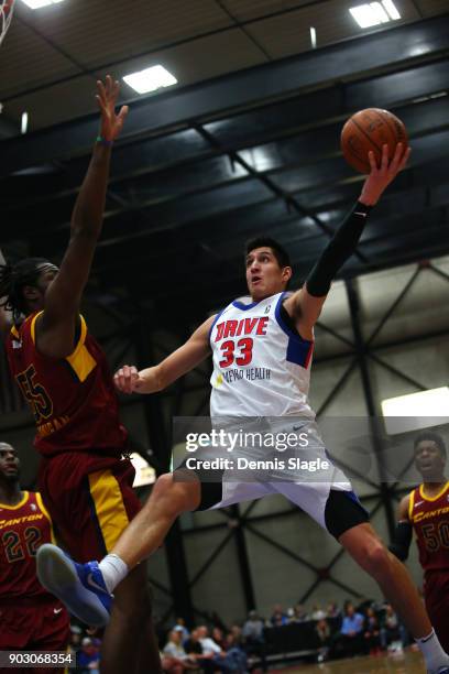 Derek Willis of the Grand Rapids Drive drives to the basket against the Canton Charge at The DeltaPlex Arena for the NBA G-League on JANUARY 6, 2018...