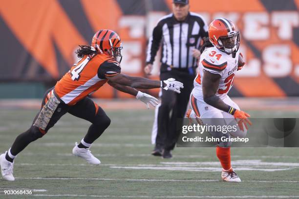 Adam Jones of the Cincinnati Bengals chases down Isaiah Crowell of the Cleveland Browns during their game at Paul Brown Stadium on November 26, 2017...