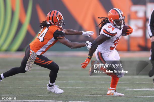 Adam Jones of the Cincinnati Bengals chases down Isaiah Crowell of the Cleveland Browns during their game at Paul Brown Stadium on November 26, 2017...