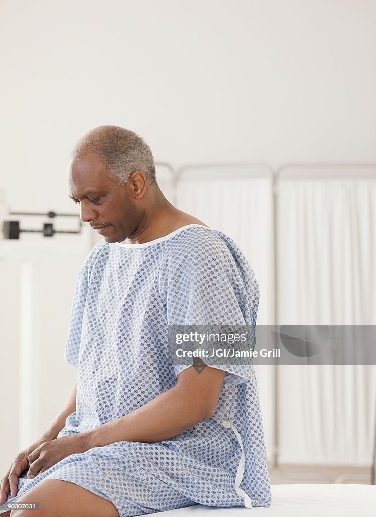 African man waiting for doctor in hospital