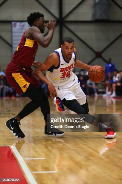 Jamel Morris of the Grand Rapids Drive handles the ball against the Canton Charge at The DeltaPlex Arena for the NBA G-League on JANUARY 6, 2018 in...