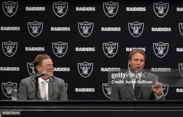 Oakland Raiders owner Mark Davis looks on as Oakland Raiders new head coach Jon Gruden speaks during a news conference at Oakland Raiders...