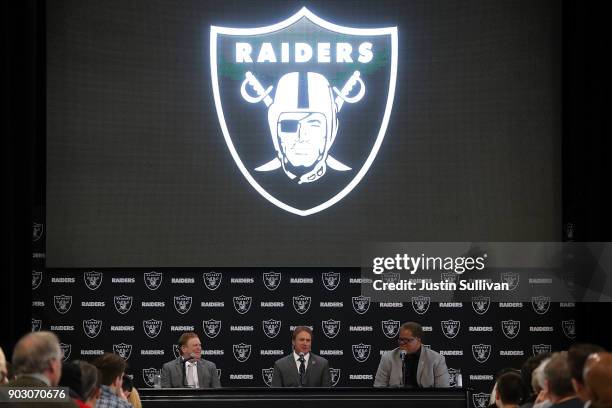 Oakland Raiders owner Mark Davis, Oakland Raiders new head coach Jon Gruden and Oakland Raiders general manager Reggie McKenzie speak during a news...