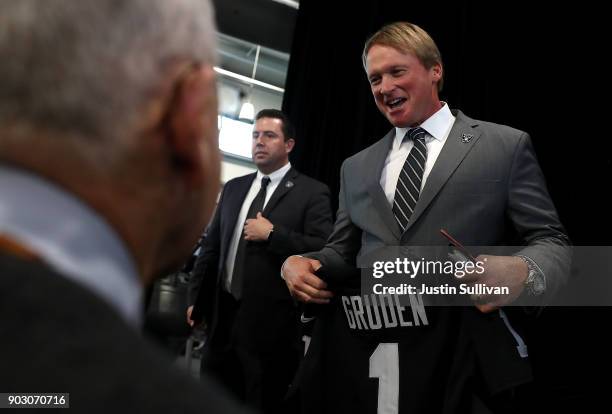 Oakland Raiders new head coach Jon Gruden looks on during a news conference at Oakland Raiders headquarters on January 9, 2018 in Alameda,...