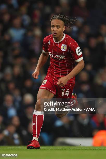 Bobby Reid of Bristol City in action during the Carabao Cup Semi-Final first leg match between Manchester City and Bristol City at Etihad Stadium on...