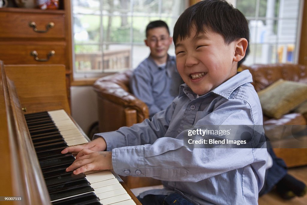 Korean boy playing piano
