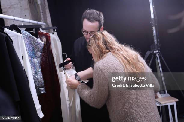 Zaid Affas and Miroslava Duma are seen backstage at the International Woolmark Prize 2017/2018 on January 9, 2018 in Florence, Italy.