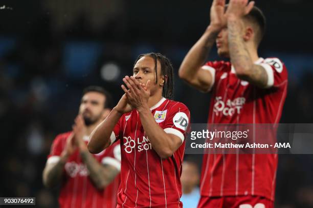 Bobby Reid of Bristol City applauds the fans at the end of the Carabao Cup Semi-Final first leg match between Manchester City and Bristol City at...