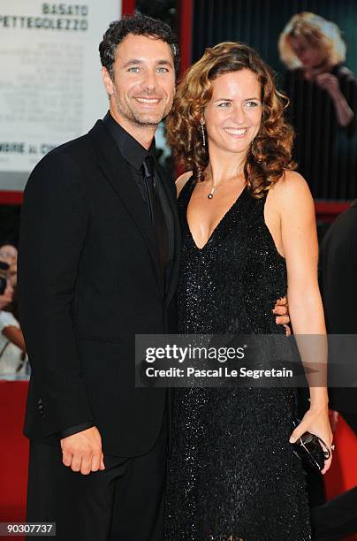 Actor Raoul Bova and wife Chiara Giordano attend the Opening Ceremony and Baaria Red Carpet at the Sala Grande during the 66th Venice Film Festival...
