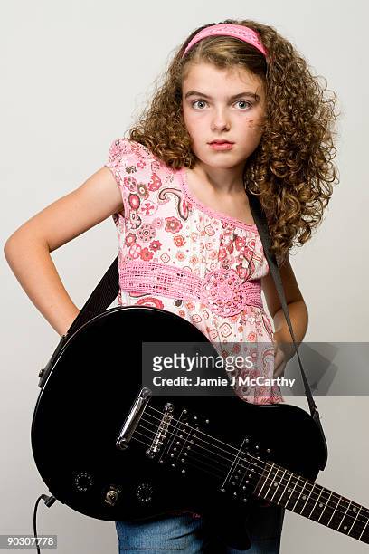 young girl with guitar - belt stock pictures, royalty-free photos & images