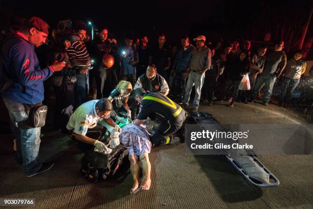 Dr. Chiu tends to a badly injured woman, who was a victim of a hit and run driver. She died shortly after on the scene. Guatemala City has one of...