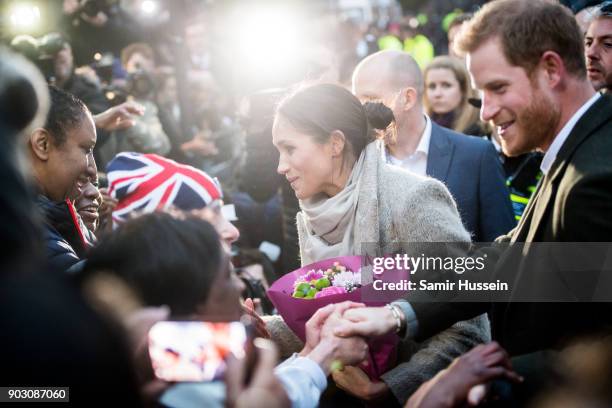 Prince Harry and Meghan Markel meet wellwishers as they visit Reprezent 107.3FM on January 9, 2018 in London, England. The Reprezent training...