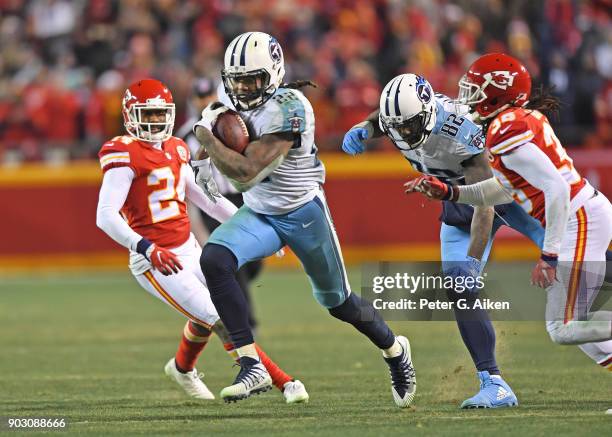 Running back Derrick Henry of the Tennessee Titans runs up field for a firstdown during the second half of the game against the Kansas City Chiefs at...